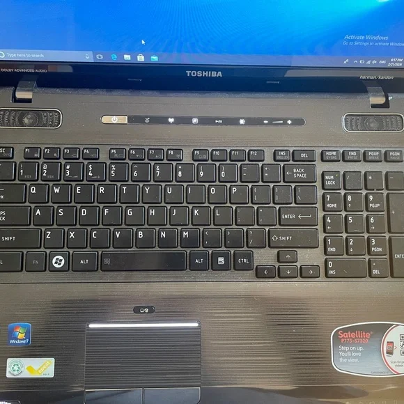 Toshiba Black Laptop with Windows working well but it’s old